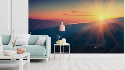 Fototapeta Panoramiczny widok na kolorowy wschód słońca w górach