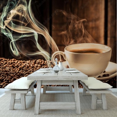 Fototapeta Filiżanka kawy z prażonymi ziarnami