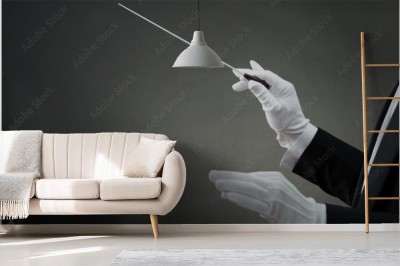 Fototapeta Ręka dyrygenta muzycznego instruująca batutą