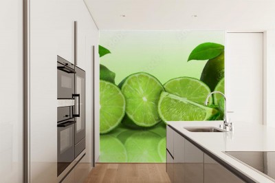 Fototapeta Krojone limonki w panoramicznym ujęciu