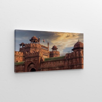 Obraz na płótnie Czerwony Fort Delhi o zachodzie słońca z nastrojowym niebem - miejsce światowego dziedzictwa UNESCO 