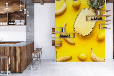 Fototapeta Naturalny ananas, banany i cytryny na żółtym tle