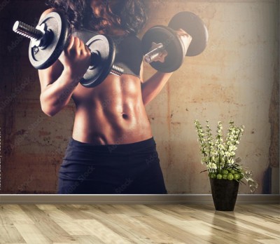 Fototapeta Trening silnego ciała kobiety