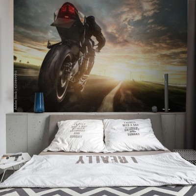 Fototapeta Motocykl przy pełnej prędkości na wiejskiej drodze