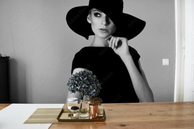 Fototapeta portret eleganckiej kobiety w czarno-białym kapeluszu