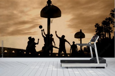 Fototapeta Koszykarze o zachodzie słońca