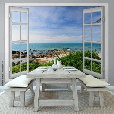 Fototapeta morze widoczne przez otwarte okno