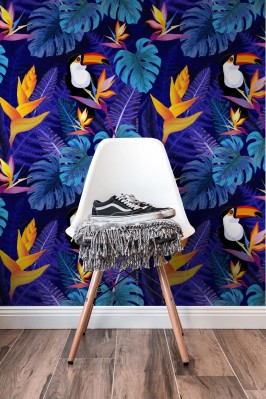 Tapeta Tukany między tropikalnymi liśćmi