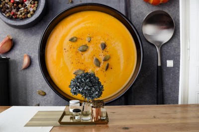 Fototapeta Zupa dyniowa i marchewkowa z nasionami Widok z góry