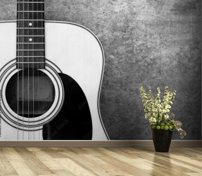 Fototapeta Gitara akustyczna na tle betonowej ściany