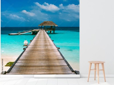 Fototapeta Piękna plaża z domkami wodnymi