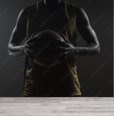 Fototapeta Mężczyzna z piłka do kosza