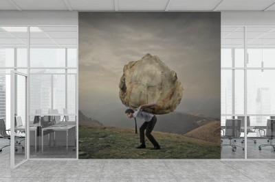 Fototapeta Biznesmen niosący dużą skałę