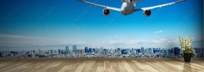 Fototapeta Samolot pasażerski nad Azjatyckim miastem