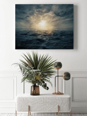 Obraz na płótnie Zachód słońca na wzburzonym morzu