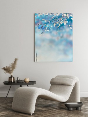 Obraz na płótnie Niebieski motyl na kwiatach