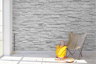 Fototapeta Ściana z jasnopopielatych płytek kamiennych