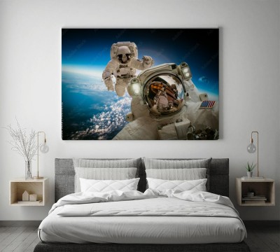 Obraz na płótnie Astronauci w kosmosie