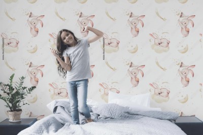 Fototapeta Słodki mały króliczek śpiący na chmurze