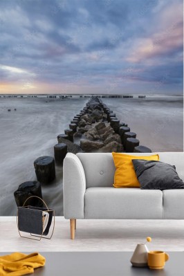 Fototapeta Morski falochron i zachód słońca nad morzem