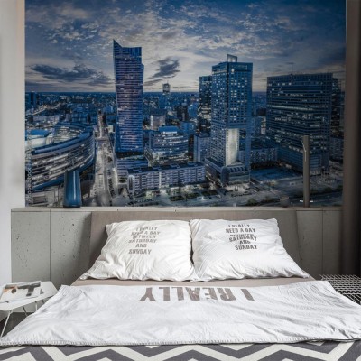 Fototapeta Warszawa z nowoczesnym wieżowcem o zachodzie słońca