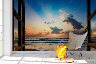 Fototapeta Widok na wschód słońca nad morzem z otwartego okna