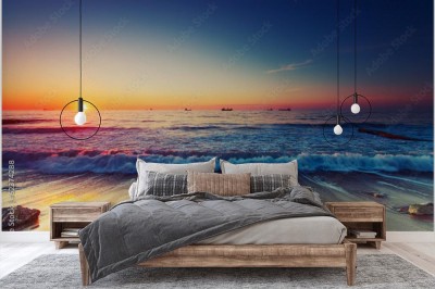 Fototapeta Wschód słońca nad morzem