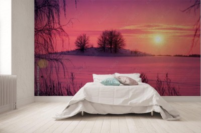 Fototapeta Zachód słońca nad ośnieżonym polem