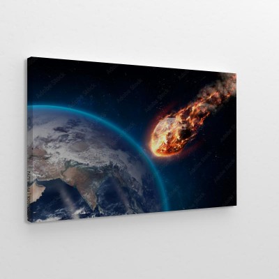 Obraz na płótnie Płonący meteor, wchodzący w atmosferę ziemską