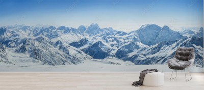 Fototapeta Ośnieżony grzbiet łańcucha górskiego w Rosji