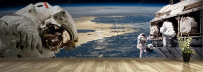 Fototapeta Zespół astronautów wykonujących prace na stacji kosmicznej