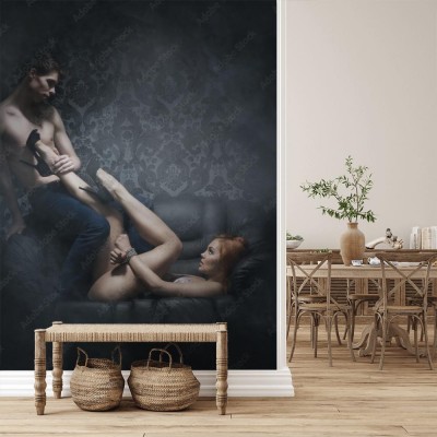 Fototapeta Młoda i piękna para na skórzanej kanapie