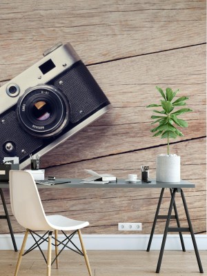 Fototapeta Vintage aparat na drewnianym stole