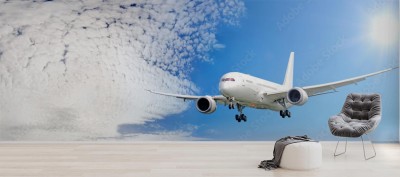 Fototapeta z panoramicznym wzorem samolotu w chmurach