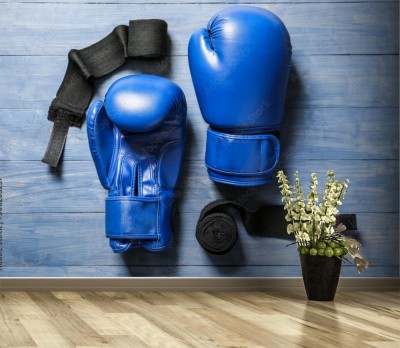 Fototapeta Bokserskie rękawice na drewnianym tle