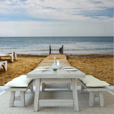 Fototapeta Drewniana droga na plaży do morza