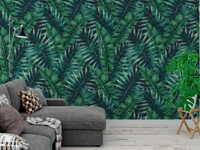 Fototapeta z ciemnym roślinnym wzorem tropikalnych liści