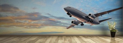 Fototapeta Nowoczesny samolot pasażerski - lot w panoramę słońca